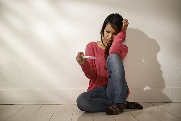 A woman discouraged by infertility.